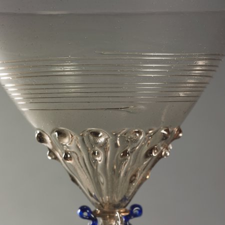 A detail of a glass goblet