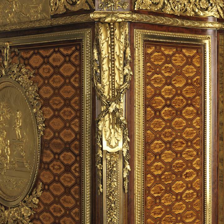 Detail of gilt-bronze mounts on corner of desk