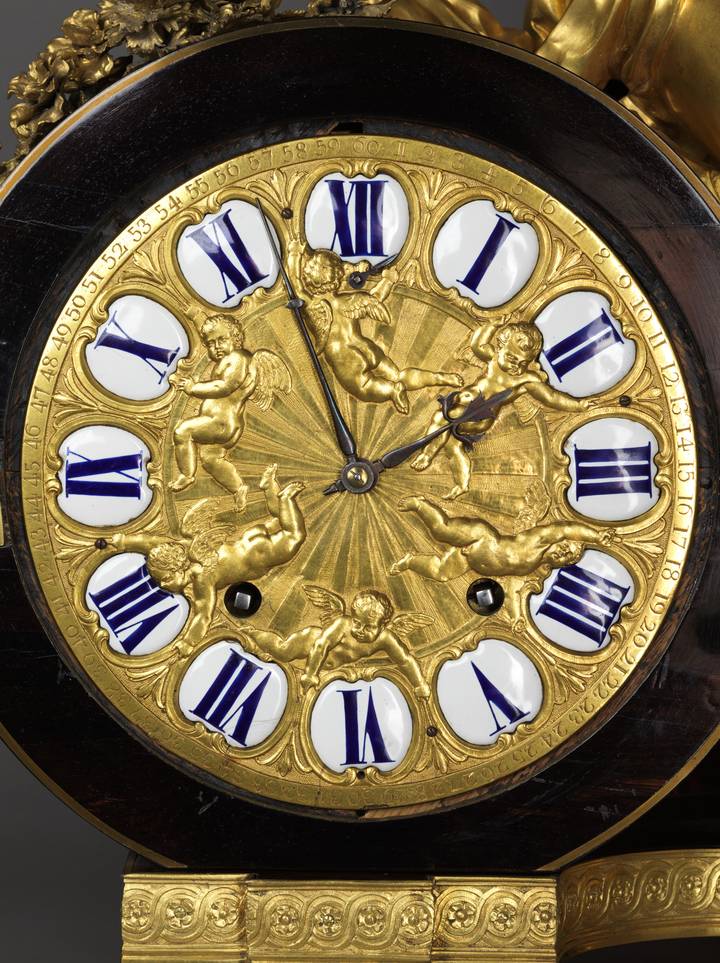 The gilt-bronze clock face. Mantel Clock (F93).