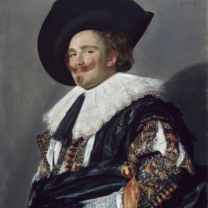 A portrait of a man wearing a hat