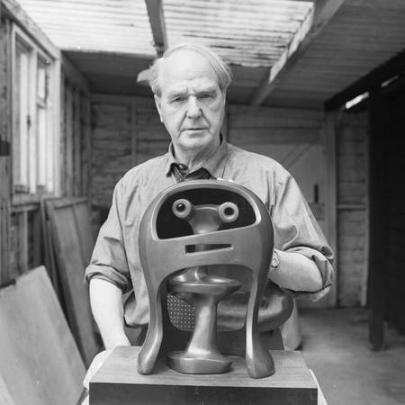 An image of a man with a helmet sculpture